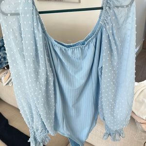 Light blue flowy sleeves body on body suit